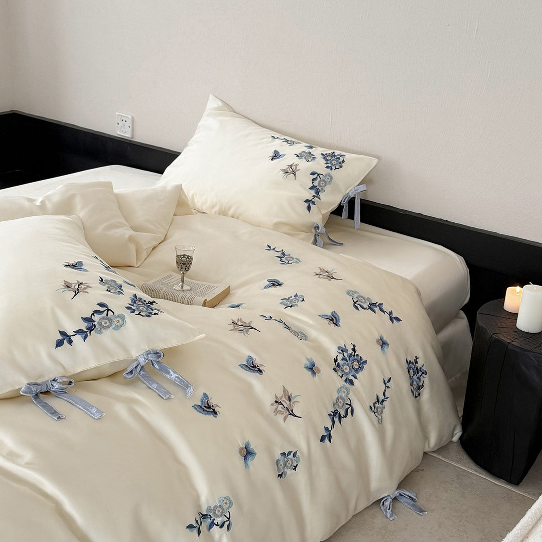 Luxury Cotton Sateen Bed Linen Set with Hand-Style Blue Floral Embroidery & Bow-Tie Shams