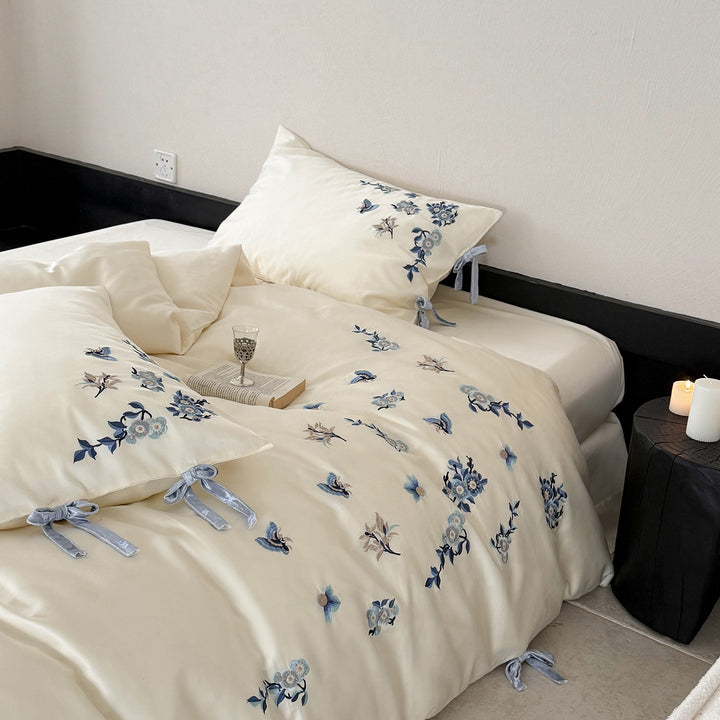 Luxury Cotton Sateen Bed Linen Set with Hand-Style Blue Floral Embroidery & Bow-Tie Shams