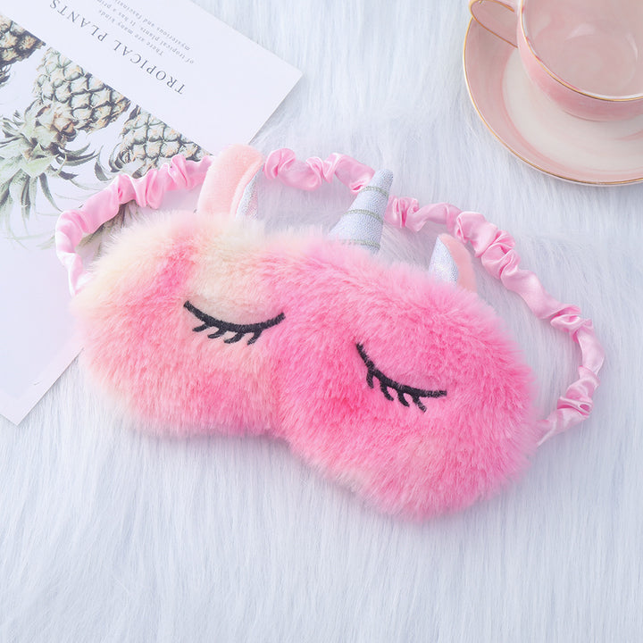 Women's plush-filled unicorn sleep mask with 3D horn, embroidered eyelashes and adjustable satin band Stornfield