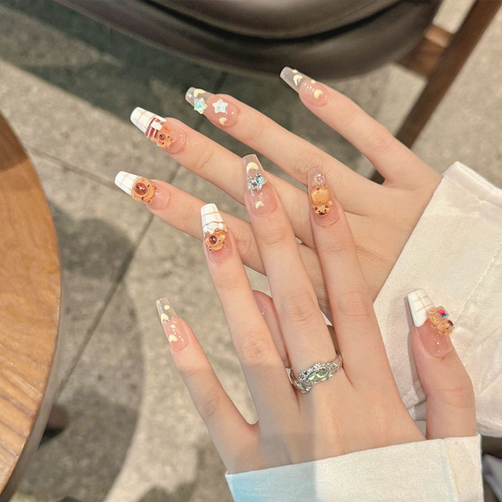 Artificial nail set with charming animal design and sparkling crystal embellishments Stornfield