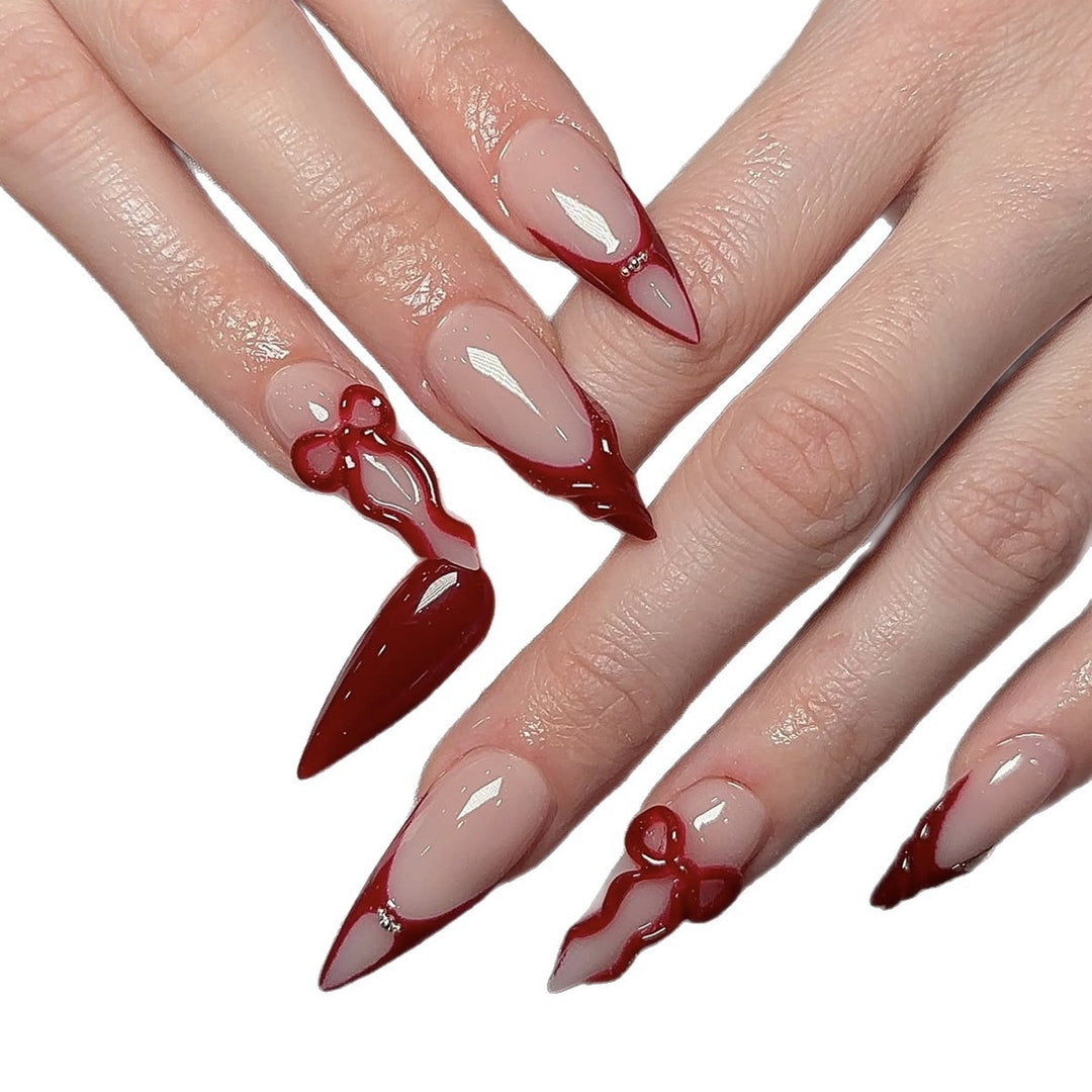 High-quality artificial nail set with elegant tips and bow decorations Stornfield
