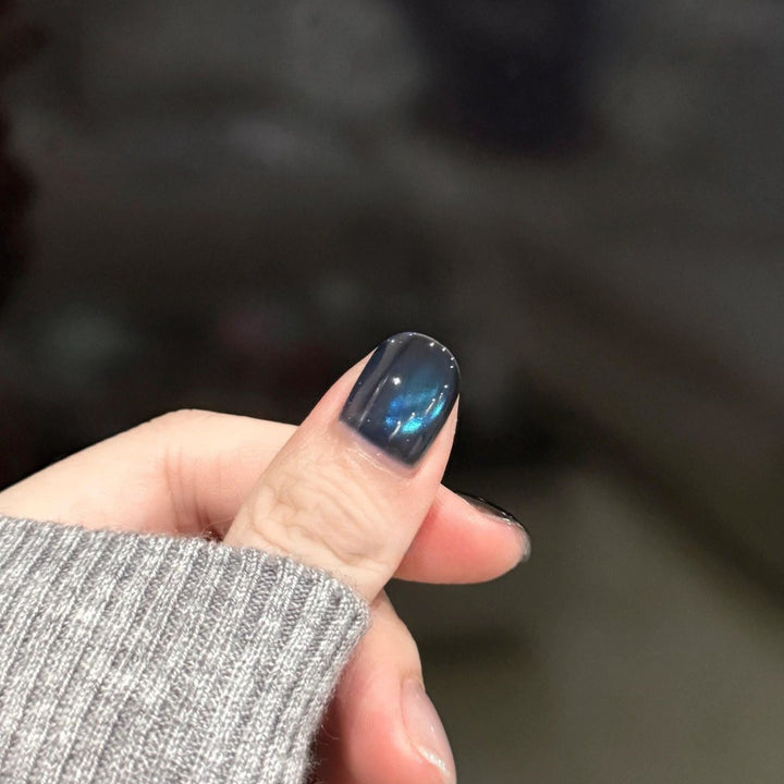 Artificial nails with elegant star design and shimmering effects Stornfield