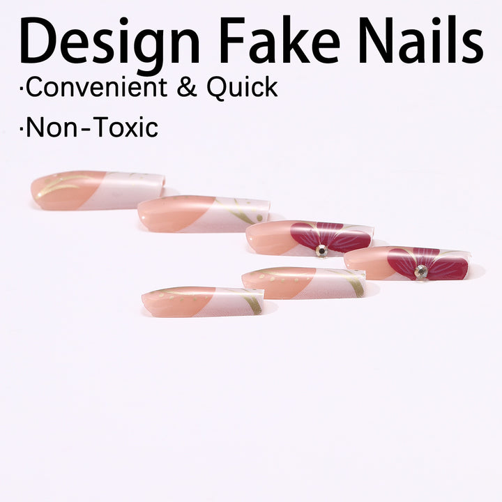 Artificial nail set with floral detail and glitter accents Stornfield