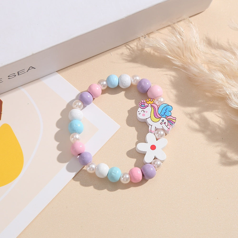 Playful children's bracelet with unicorn and flower motif Stornfield