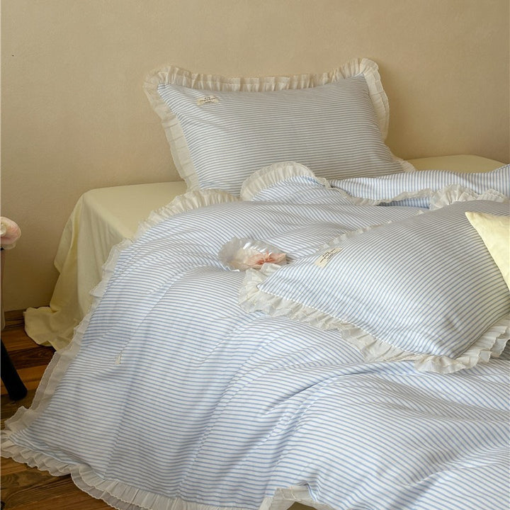 Bedding set made of cotton percale with a fine stripe pattern and gathered ruffle