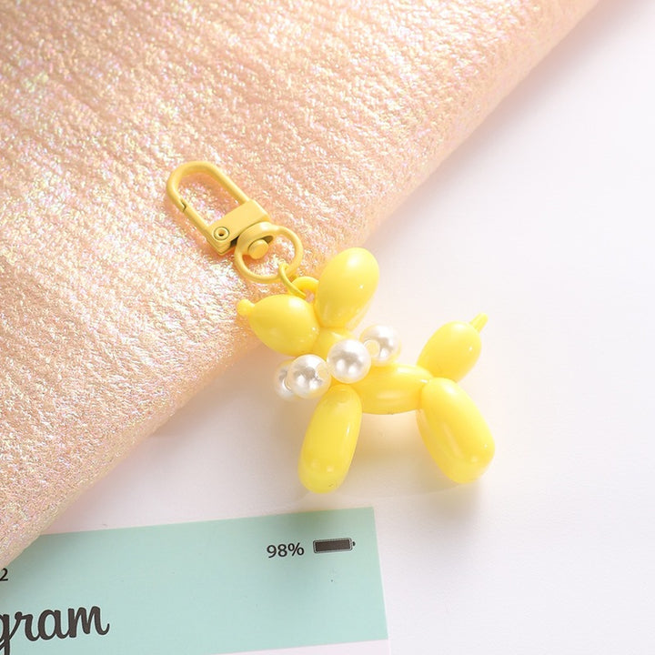Playful keychain with balloon dog and beads Stornfield