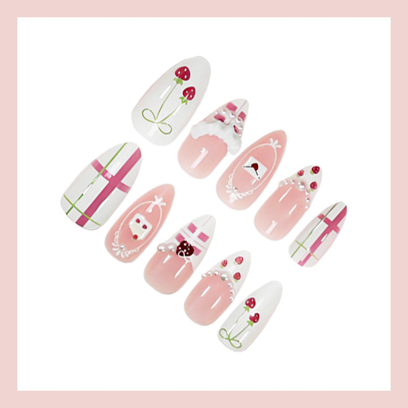 Artificial nail set with playful flowers and elaborate decorations Stornfield