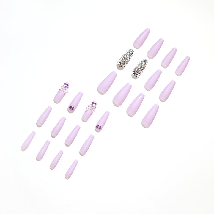 Artistic Stiletto Nails with Glitter and Flower Decorations Stornfield