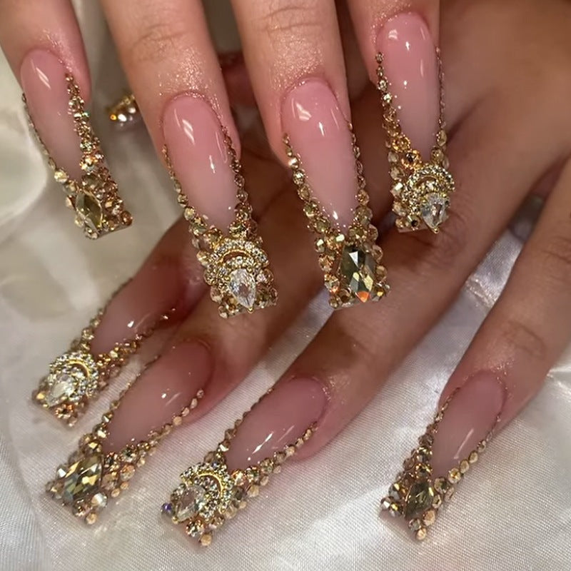 Artificial nail set with elegant rhinestone and glitter accents Stornfield