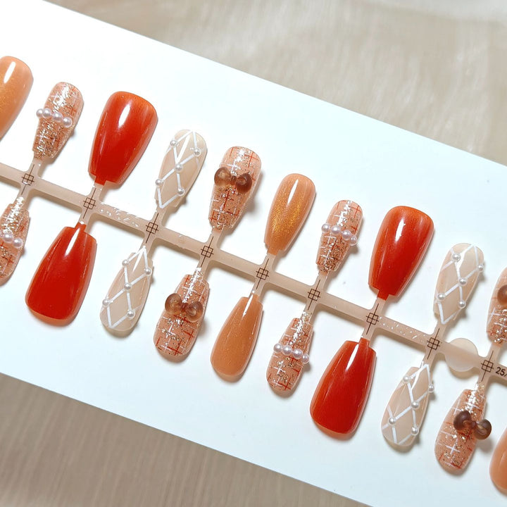 Artificial nails with elegant pearl decorations Stornfield