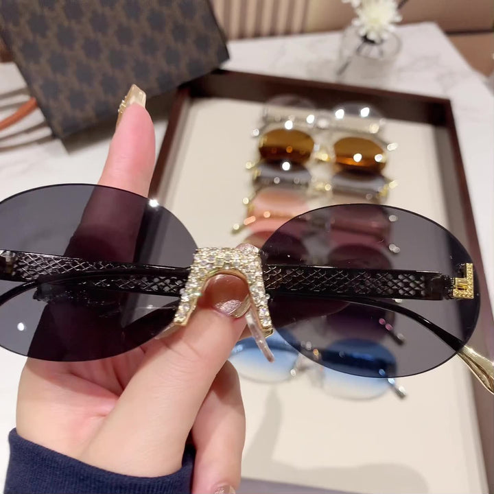 Women's sunglasses with glittering frame and oval lenses Stornfield