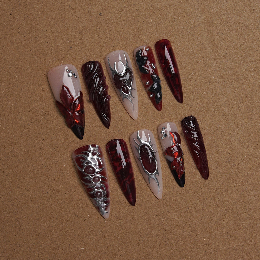 Acrylic nail set with artistic designs Stornfield