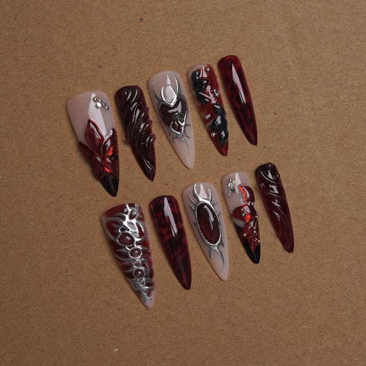 Acrylic nail set with artistic designs Stornfield