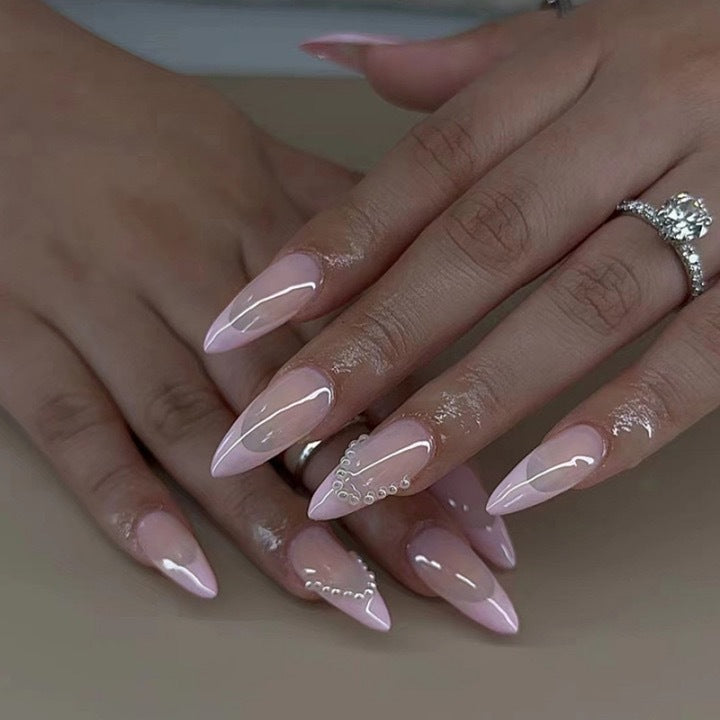 Elegant artificial nail tips with glitter and pearl decorations Stornfield