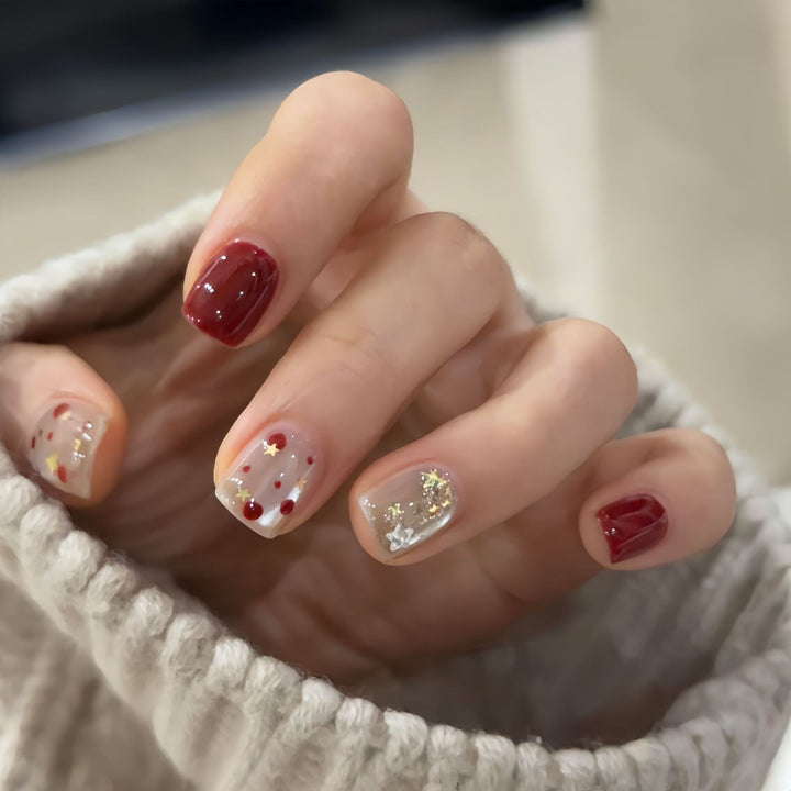Nail set with sparkling glitter details and creative designs Stornfield
