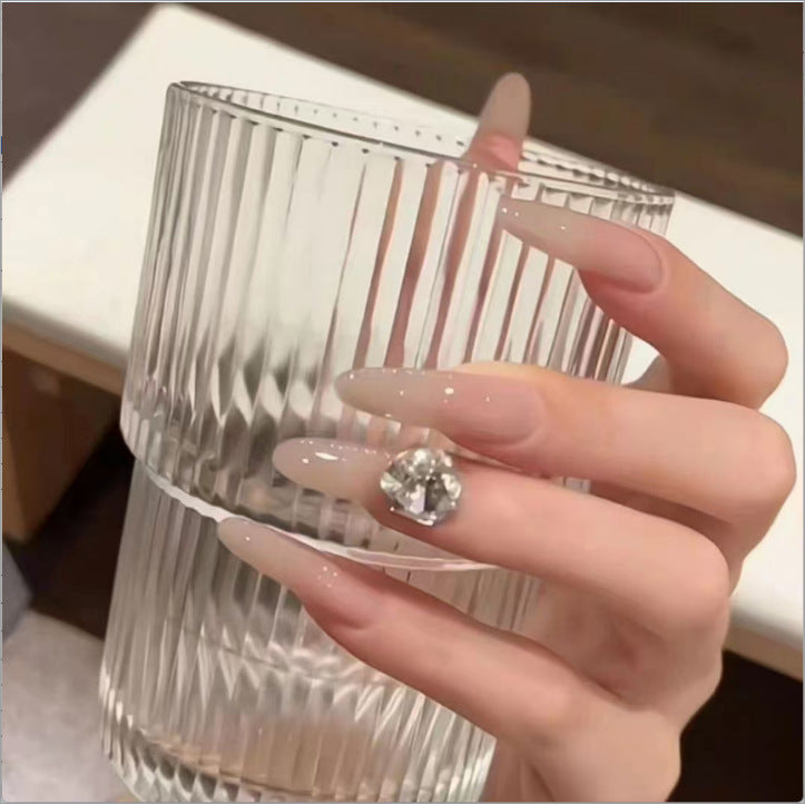 Elegant artificial nails with glitter and crystal accents Stornfield