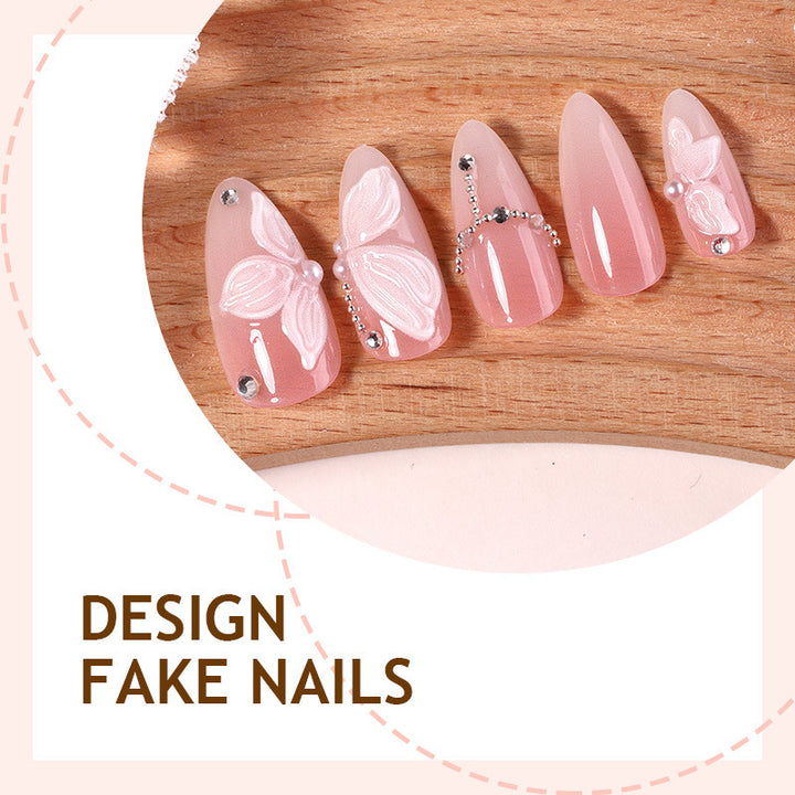 Artificial nails with delicate butterfly design and glitter accents Stornfield