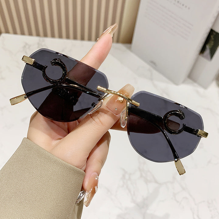 Women's trendy chic sunglasses in modern design with delicate metal frame Stornfield