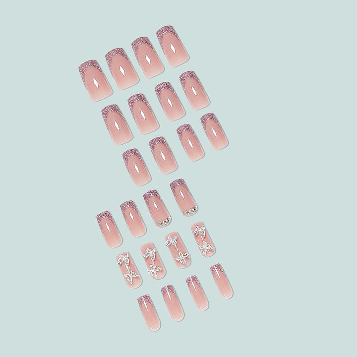 Glamorous stiletto artificial nails with glitter and crystal elements Stornfield