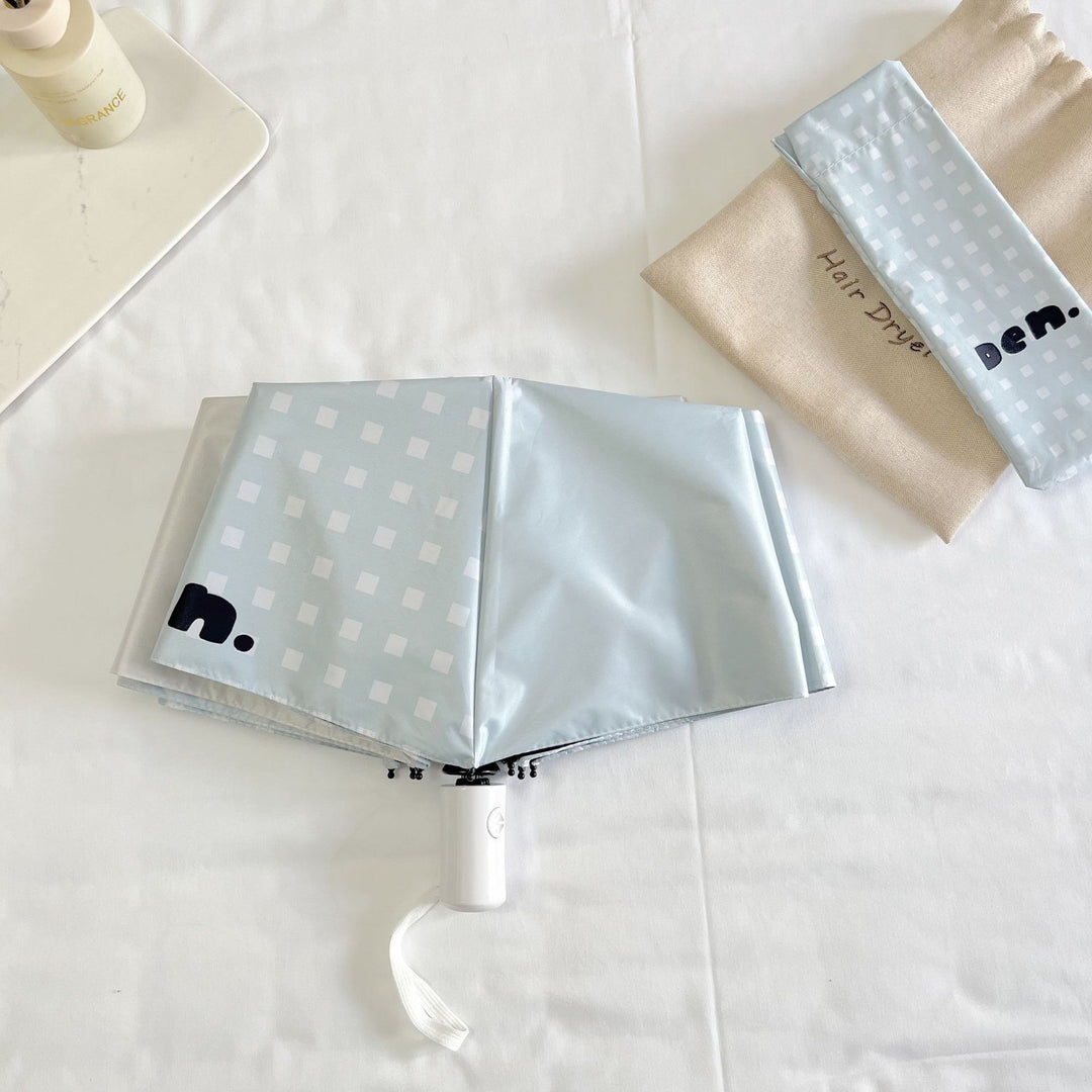 Women's folding umbrella with unique star pattern and practical carrying bag Stornfield