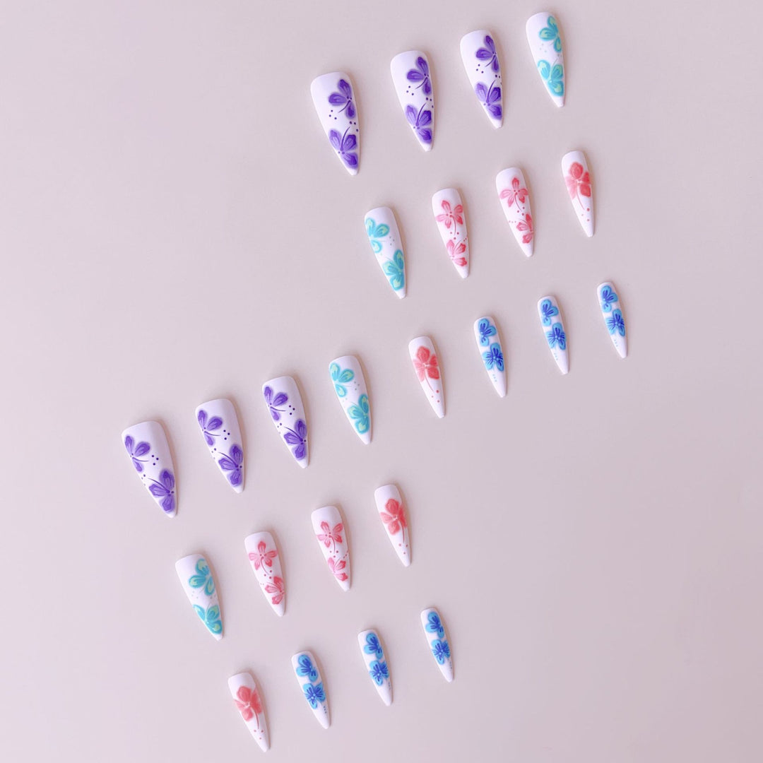 Artificial nail set with lively 3D floral designs Stornfield