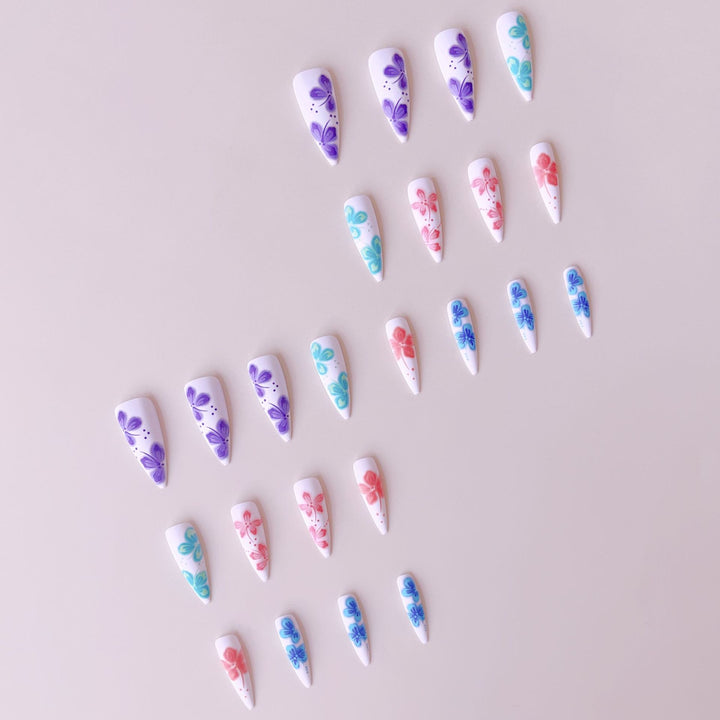 Artificial nail set with lively 3D floral designs Stornfield