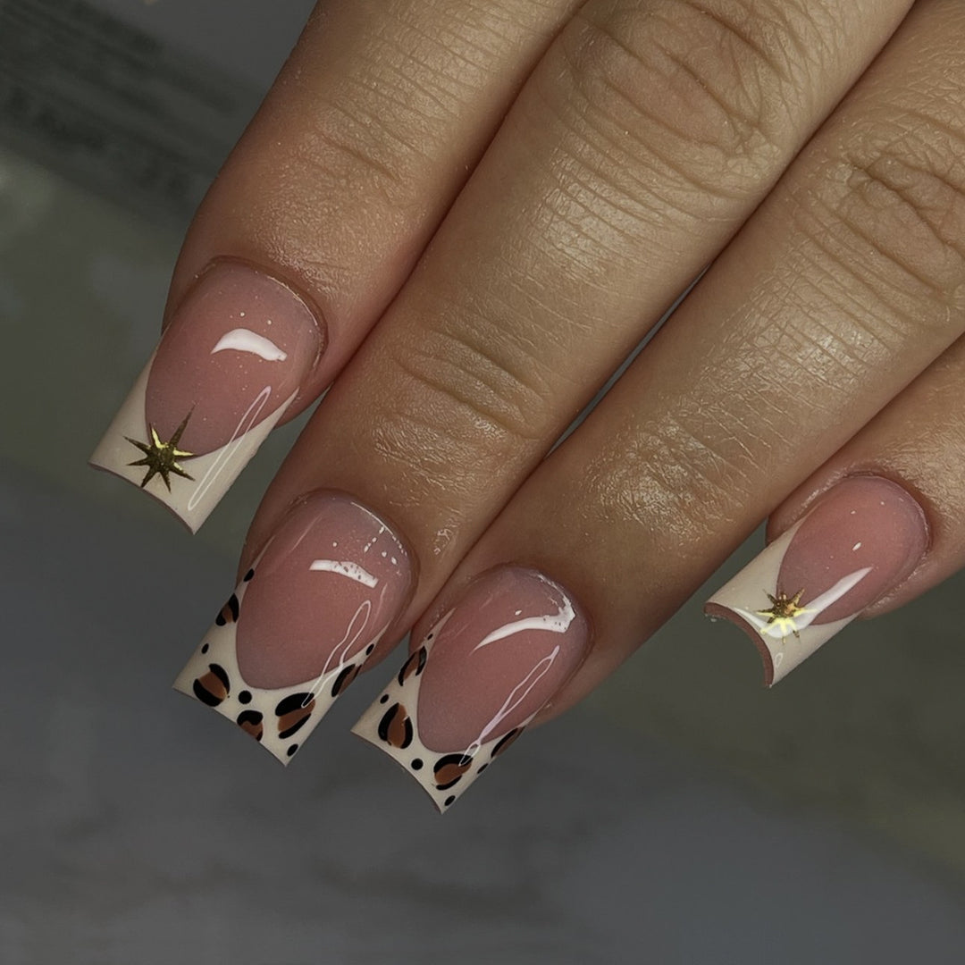 Creative nail art set with elegant leopard and glitter accents Stornfield