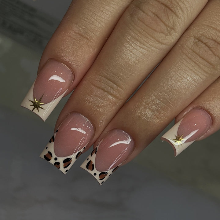 Creative nail art set with elegant leopard and glitter accents Stornfield