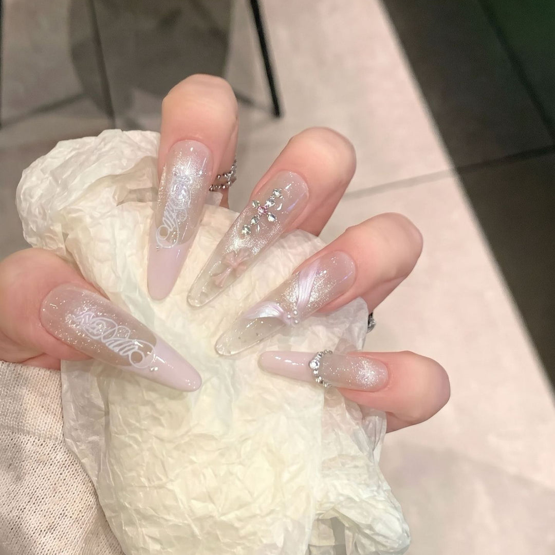Elegant Stiletto Press-On Nail Set with Intricate Designs Stornfield