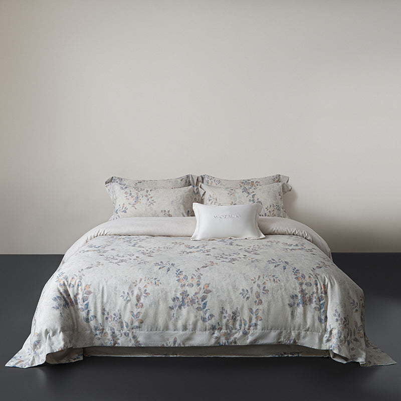 Linen-look cotton duvet cover set with delicate watercolor flower pattern and reversible function