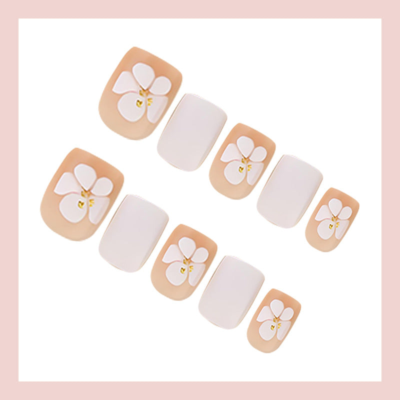 Artificial nail set with luxurious flower design and subtle gold accents Stornfield