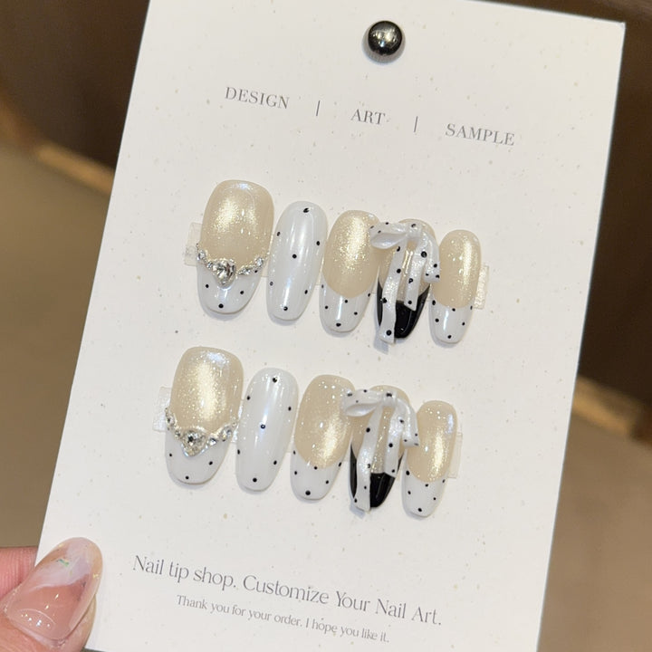 Artificial nails with glitter and bows Stornfield