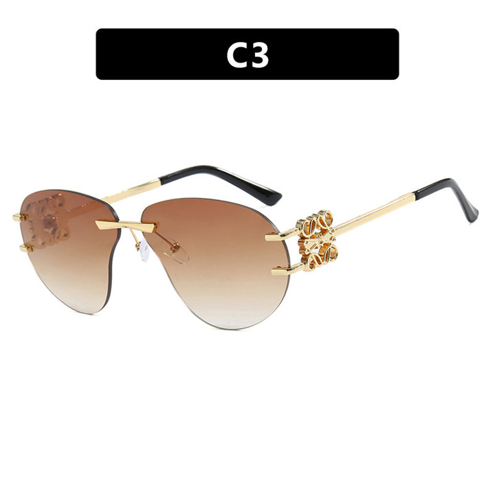 Women's fashionable sunglasses in elegant aviator style with gemstone details Stornfield