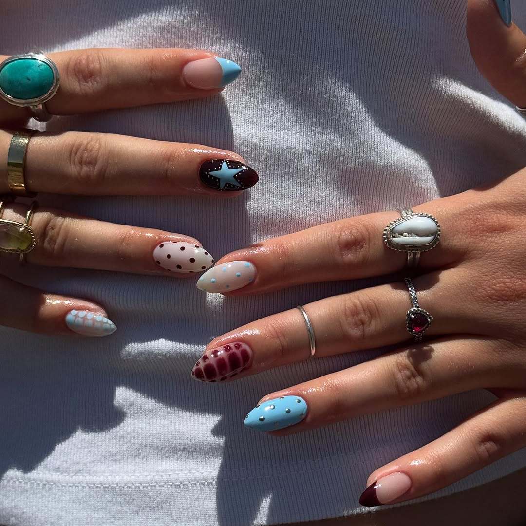 Artificial nail set with creative patterns and playful accents Stornfield