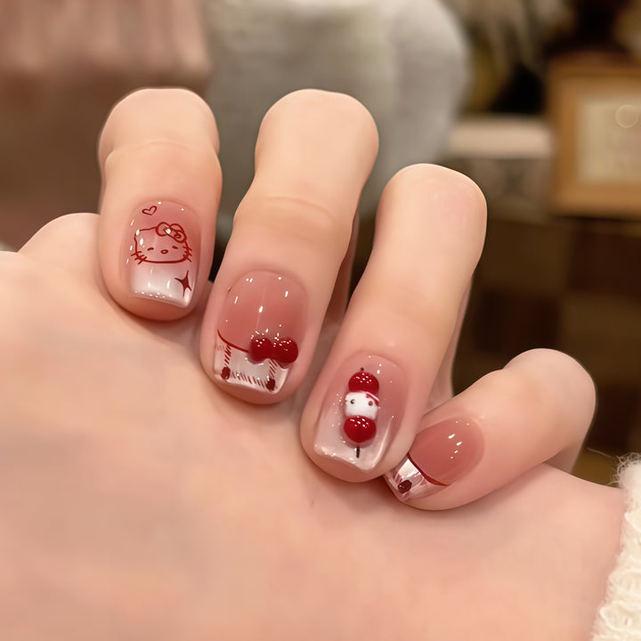 Artificial nails with playful Hello Kitty design Stornfield