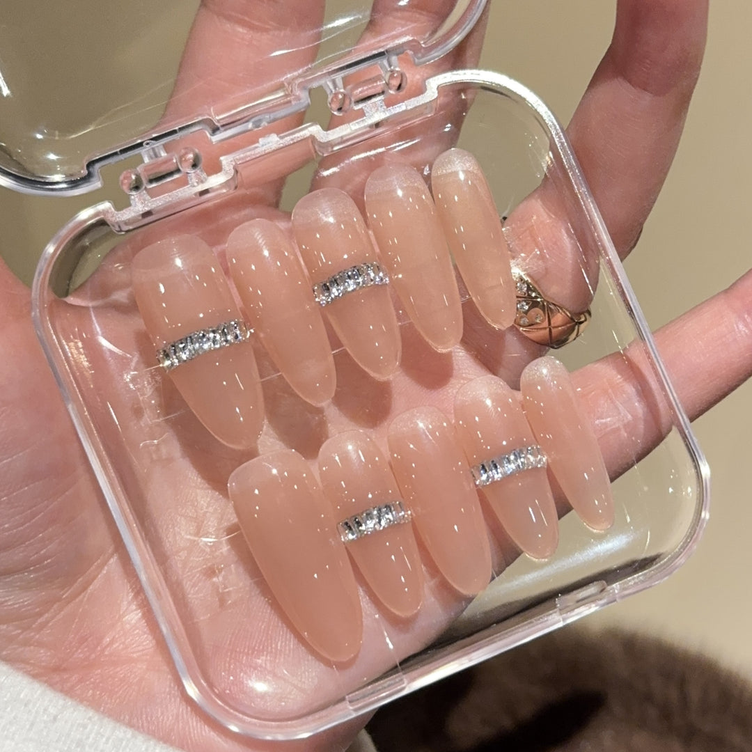 Glamorous artificial nails with rhinestones Stornfield