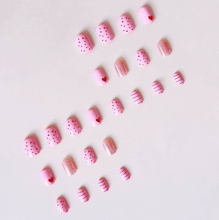 Artificial nail set with romantic heart motifs and sparkling accents Stornfield