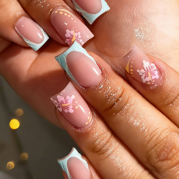 Artificial nails with floral design and glitter details Stornfield