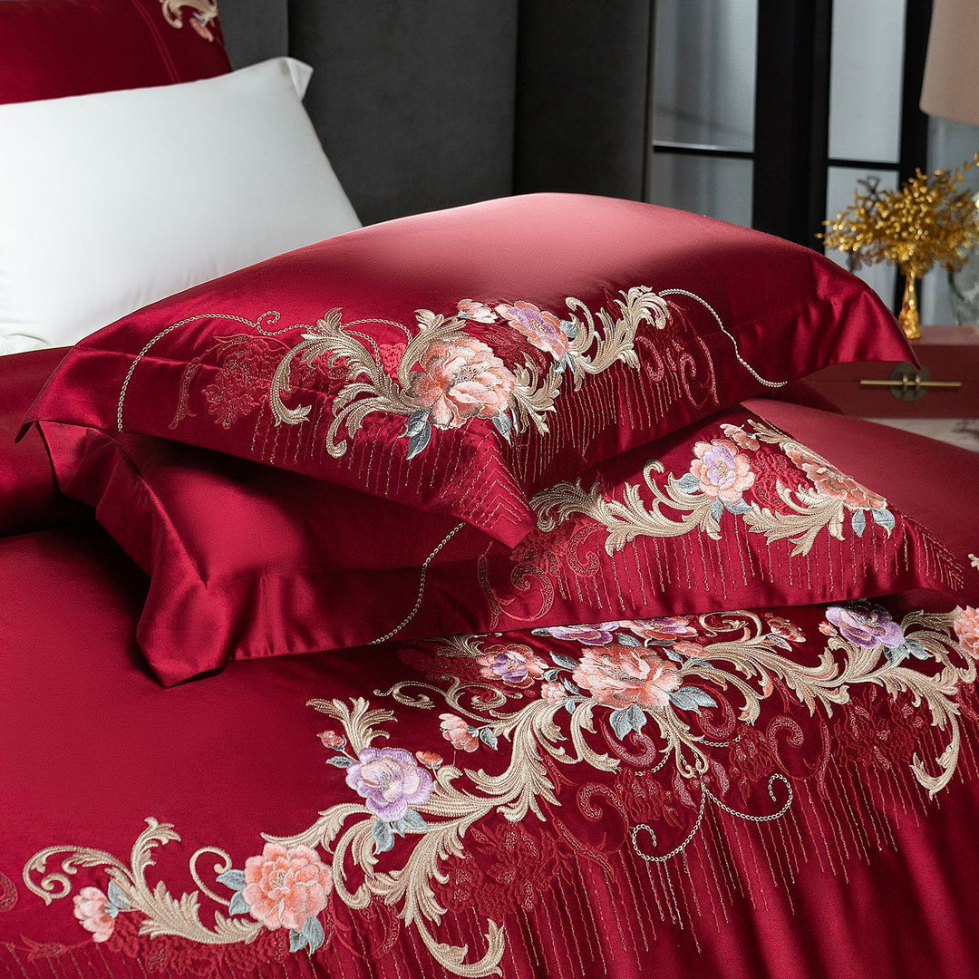 Embroidered satin bedding set with luxury appliqués