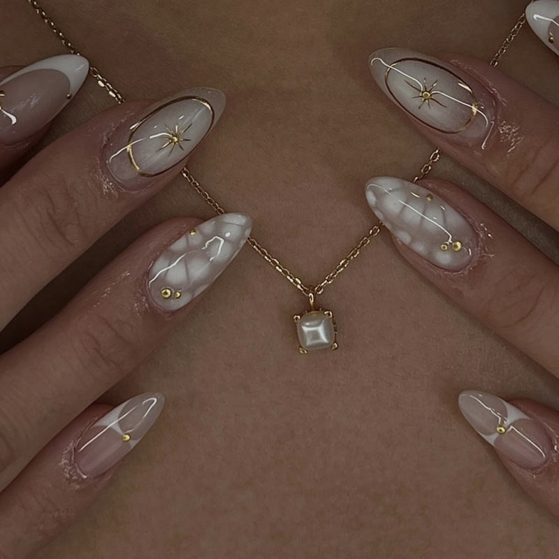 Elegant artificial nails with lustrous accents Stornfield