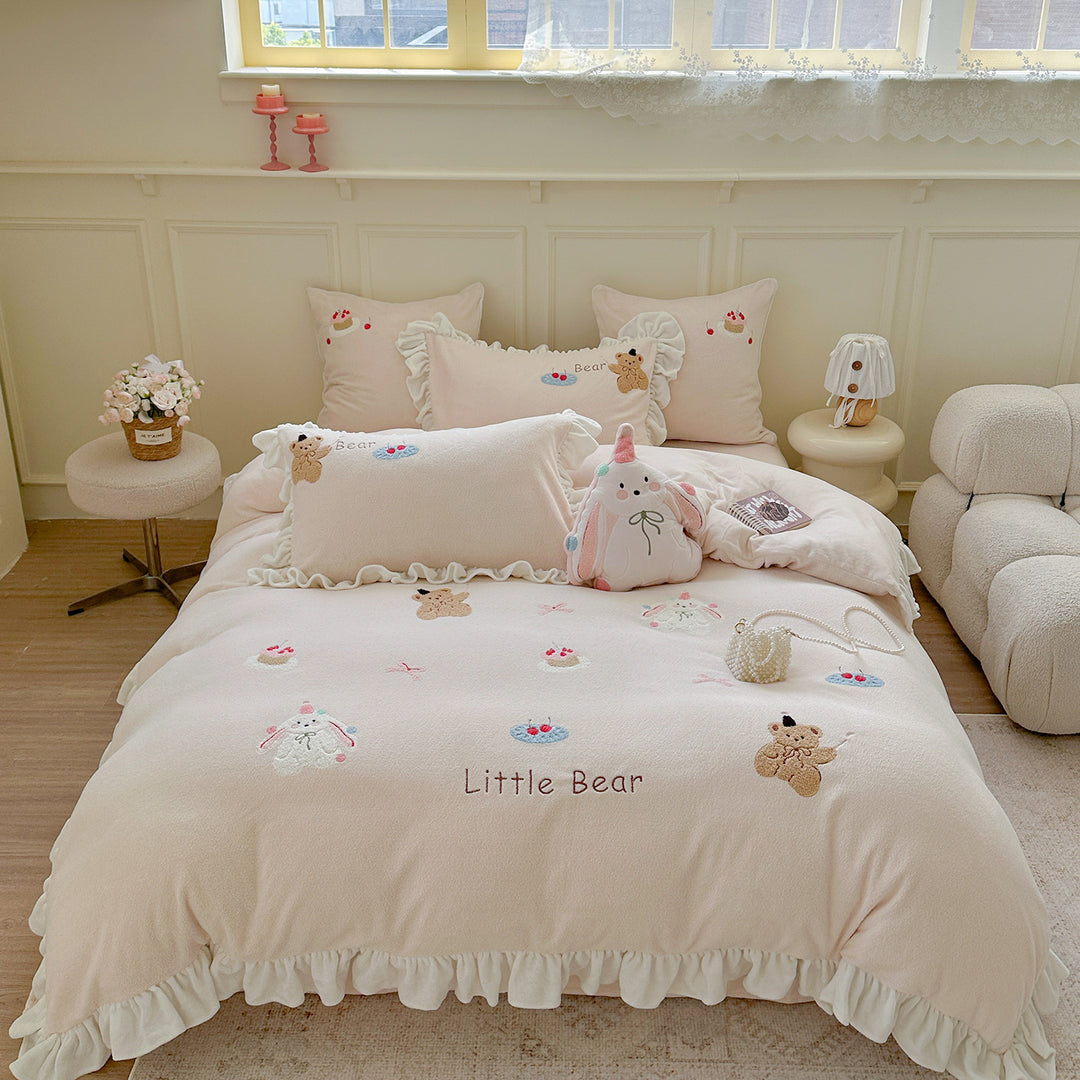 Bedding set with plush surface, ruffled hem and cute embroidery designs