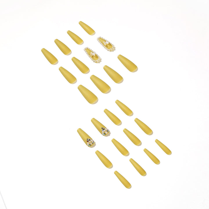 Artful stiletto nails with luxurious glitter accents Stornfield