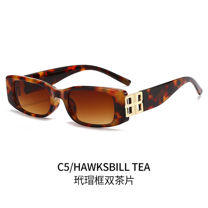 Ladies' fashionable sunglasses with luxurious gold-colored accent Stornfield
