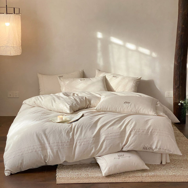 Stonewashed Organic Cotton Duvet Cover Set with Embroidered Pillow Shams and Pintuck Detail