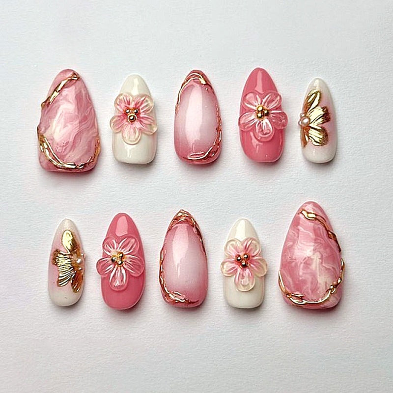 Artificial nail set with elegant flower and glitter details Stornfield