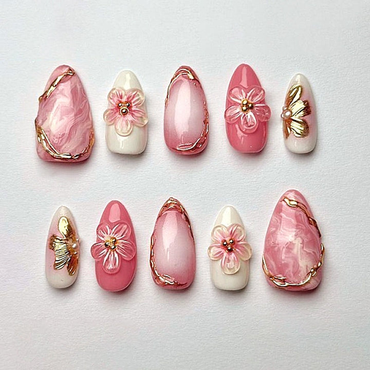 Artificial nail set with elegant flower and glitter details Stornfield
