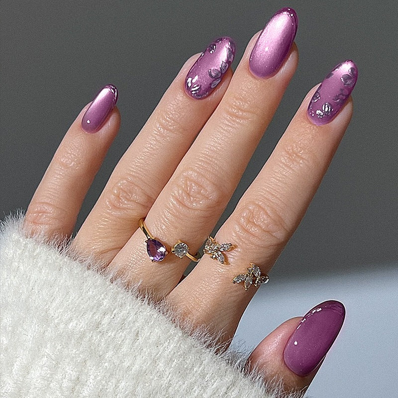 Elegant artificial nail set with shimmering accents and decorative designs Stornfield
