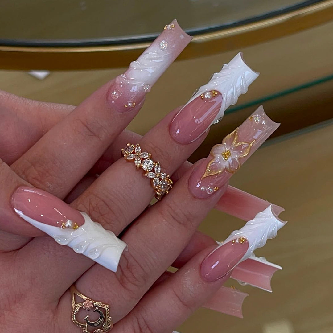 Artificial nails with handcrafted floral accents Stornfield