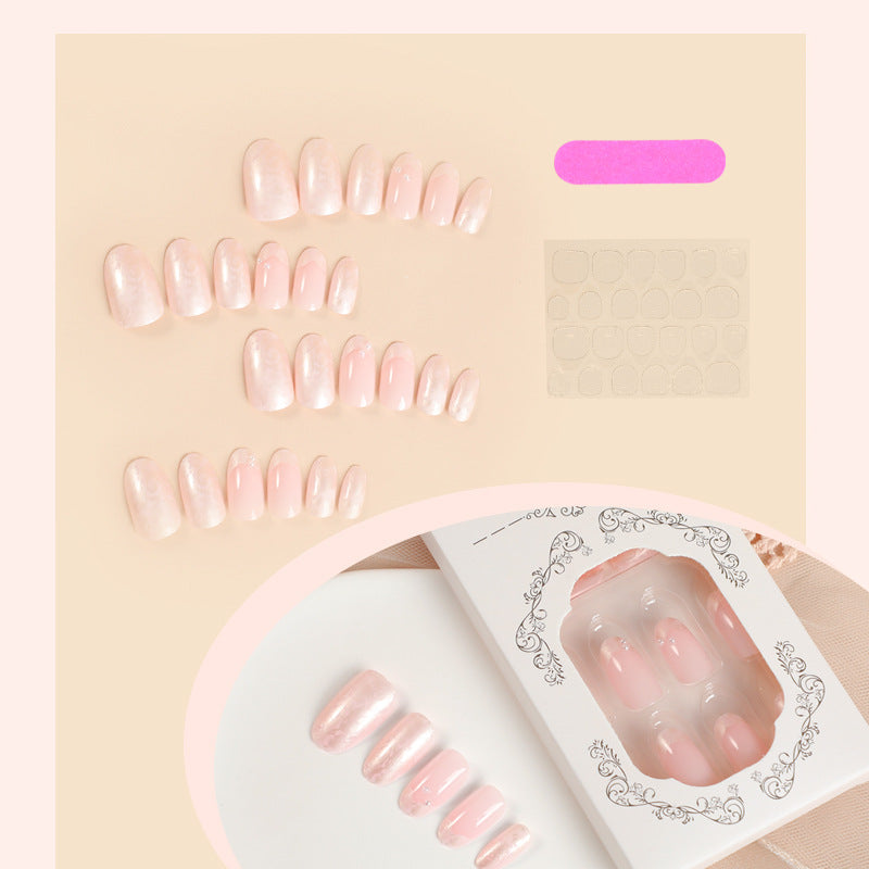 Artificial nail set with shimmering pearl and glittering accents Stornfield