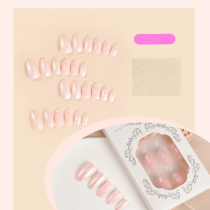 Artificial nail set with shimmering pearl and glittering accents Stornfield